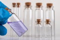 Blue liquid in a glass vial. Accessories in the laboratory Royalty Free Stock Photo