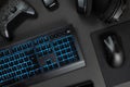 Blue lit keyboard by various wireless gadgets Royalty Free Stock Photo