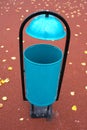 Blue litter bin aka garbage or trash bin or waste bin . Royalty Free Stock Photo