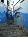 Blue little door in blue streets in North Morocco