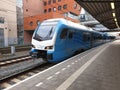 Blue local commuter train type Flirt of the Valleilijn runned by Connexxion at station Amersfoort