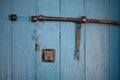 Blue locked door with open lockers close up still Royalty Free Stock Photo