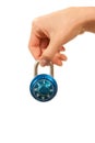 Blue locked Master Combination Dial lock in hand Royalty Free Stock Photo