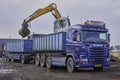 Blue lorry trailer with containers