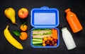 Blue Lunch Box with Vegetables and Fruits Royalty Free Stock Photo