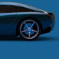 Blue Luxury Car Background with Beautiful Wheel and Brake Parts in the Center. A Modern Car with a Blue Metallic Surface. Royalty Free Stock Photo