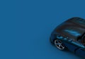 Blue Luxury Car Background with Copy Space. A Modern Car with a Blue Metallic Surface in Dim Studio Lightning. Royalty Free Stock Photo