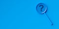 Blue magnifier or magnifying glass with question mark on blue background, search, question answer, problem or business solution