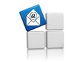 Blue mail sign with envelope on boxes Royalty Free Stock Photo