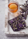 Blue mallow flowers herbal tea with vintage strainer infuser in wooden box on white background Royalty Free Stock Photo