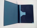 A blue map with a thick cover. A place to store document file.