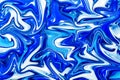 Blue marbling paint swirls background. Royalty Free Stock Photo
