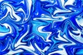 Blue marbling paint swirls background.