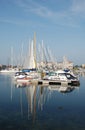 Blue marina boats reflected