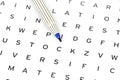 Blue Marker on solving crossword puzzle Royalty Free Stock Photo