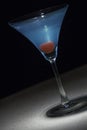 Blue Martini with cherry garnish Royalty Free Stock Photo