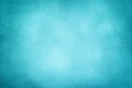Blue matte background of suede fabric with vignette, closeup. Velvet textile Royalty Free Stock Photo