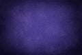 Blue matte background of suede fabric with vignette. Texture of velvet textile Royalty Free Stock Photo