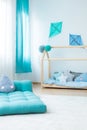 Blue mattress in boy`s bedroom