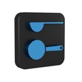 Blue Measuring spoon icon isolated on transparent background. Black square button.