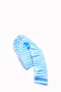 Blue medical disposable cap isolated on white Royalty Free Stock Photo