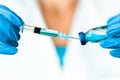 A Blue Medical Fluid Sucked into the Injection Royalty Free Stock Photo