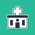 Blue Medical hospital building with cross icon isolated on green background. Medical center. Health care. Vector