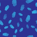 Blue Medical rubber gloves icon isolated seamless pattern on blue background. Protective rubber gloves. Vector Royalty Free Stock Photo