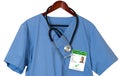 Blue scrubs shirt for medical professional with immunity certificate