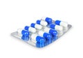 Blue medication capsules in blister pack close-up