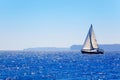 Blue Mediterranean sailboat sailing Royalty Free Stock Photo
