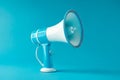 Blue megaphone on white background. Generative AI Royalty Free Stock Photo