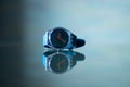 Blue men`s watch lies on a glass table close-up Royalty Free Stock Photo