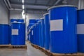 Chemical industry, paint and varnish production . Metal barrels for chemicals. Barrels are stored in a warehouse