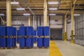 Chemical industry, paint and varnish production . Metal barrels for chemicals. Barrels are stored in a warehouse