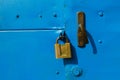 Blue metal door with a padlock. Royalty Free Stock Photo