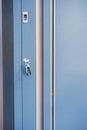 Blue metal doors with keyhole and keys Royalty Free Stock Photo