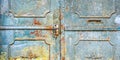 Blue metal doors. Old vintage style. Rusty texture Royalty Free Stock Photo