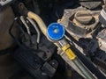 A blue metal at the end of Refrigerant Manifold Gauge