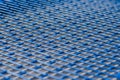 Blue metal mesh texture with rectangular holes Royalty Free Stock Photo