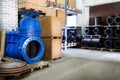 Blue metal shut-off valve for gas pipelines. Sliding knife gate valve Shutoff and control valves. boxes. fitting. Warehouse of pip Royalty Free Stock Photo