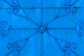 Blue metal texture wrought pattern on old wall Royalty Free Stock Photo