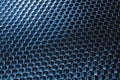 Blue metallic honeycomb grid texture pattern