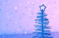 Blue metallic modern christmas tree on wood table Royalty Free Stock Photo