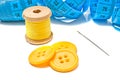 Blue meter, buttons and spool of thread Royalty Free Stock Photo
