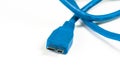 Blue micro B connector isolated on white background. Royalty Free Stock Photo