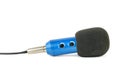 Blue microphone with wire isolated on white background Royalty Free Stock Photo
