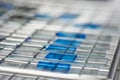 Blue microscopic slides on a rack