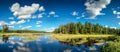 Blue mirror lake reflections of clouds and landscape. Ontario, Canada. Royalty Free Stock Photo