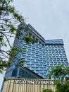 Blue modern luxury glass building low angle on a cloudy sky. Muong Thanh Hotel in Quang Ninh, Vietnam